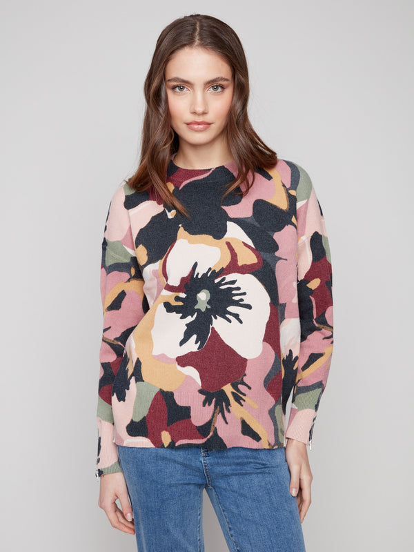 Sweater with a relaxed fit featuring an abstract floral design and sleeve zippers by Charlie B.