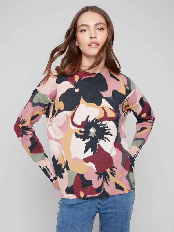 Abstract floral sweater with long sleeves and zipper accents for a stylish touch by Charlie B.