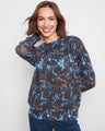 Stylish sweater featuring a crew neckline, perfect for layering with your favorite accessories. A versatile piece by Charlie B.