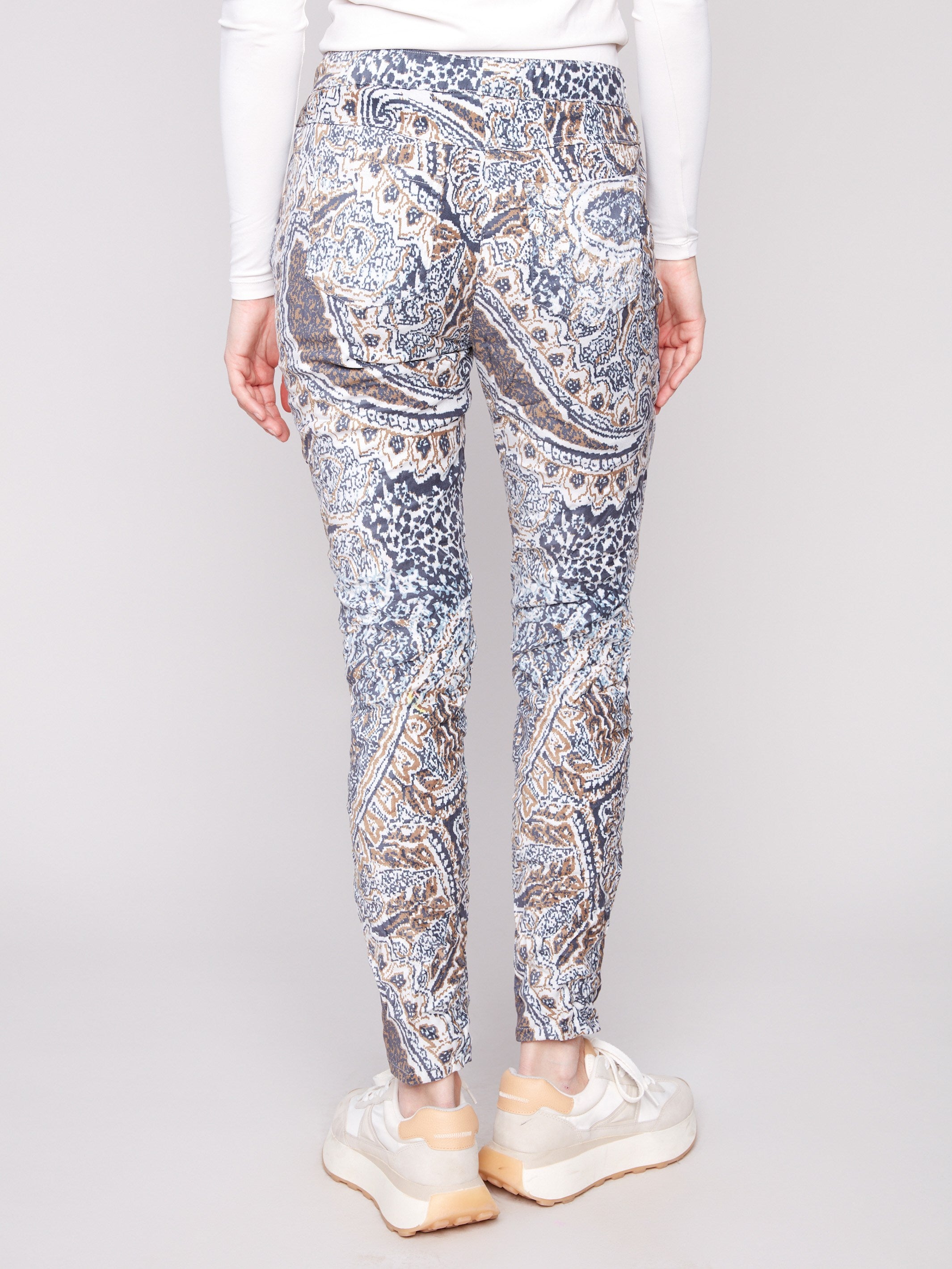 Enjoy the convenience of side pockets in these stylish bohemian print jogger pants, perfect for casual outings by Charlie B.