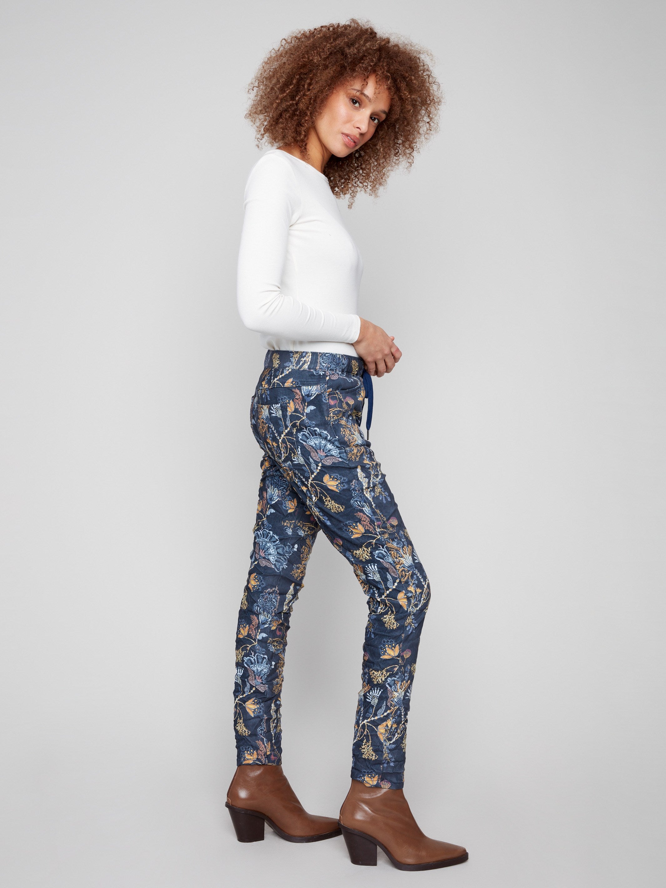 Crinkle effect jogger pants with bohemian print, offering a comfortable elastic waistband and stylish design by Charlie B.