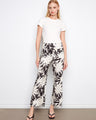 Wide-leg pants in a striking black and white leaf pattern, crafted from a stretch linen blend by Charlie B.