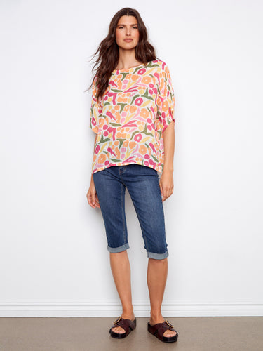 Chic dolman sleeve blouse with colorful patterns and lightweight design by Charlie B.