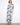 Elegant dress with a flattering V-neck and intricate pattern, emphasizing style and sophistication by Charlie B.