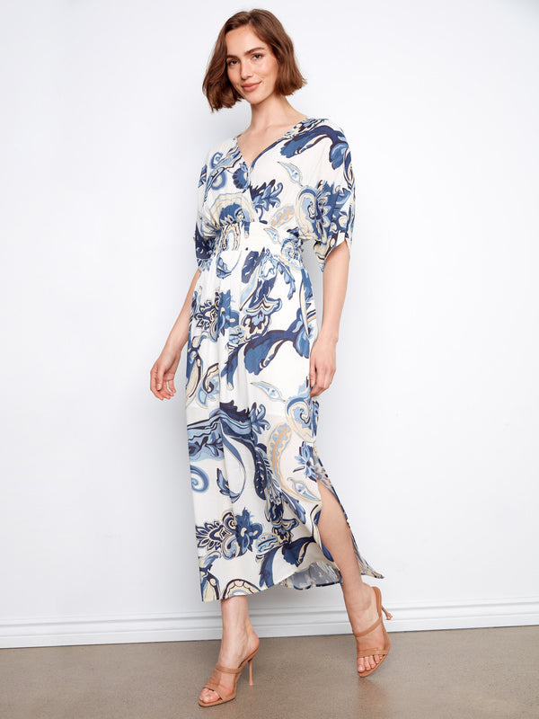 Short dolman sleeves add a relaxed yet elegant touch to this flowing maxi dress by Charlie B.