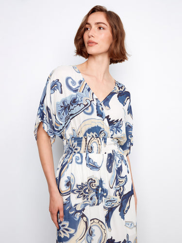 This graceful maxi length dress exudes timeless charm and sophistication by Charlie B.