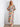 This eye-catching piece boasts a colorful pattern that is sure to turn heads wherever you go. A must-have addition by Charlie B.