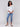 White sweater with blue heart print, featuring a v-neck and dolman sleeves by Charlie B.