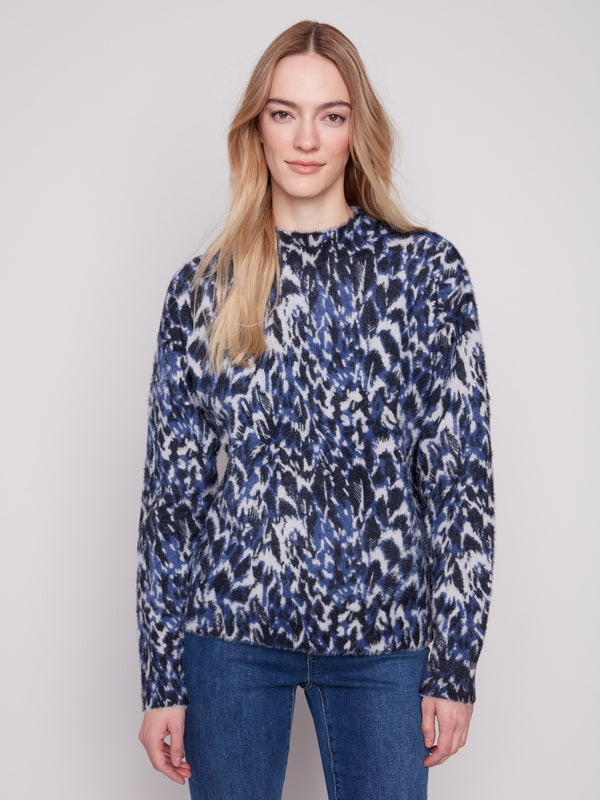 Eyelash fabric sweater featuring an abstract panther print for a stylish look by Charlie B.