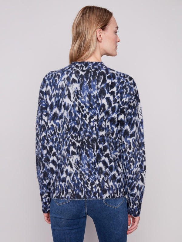 Abstract panther print sweater in a relaxed fit, perfect for cozy days by Charlie B.