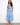 Blue and white printed eyelet cotton dress with hidden pockets, featuring a stylish belt by Charlie B.
