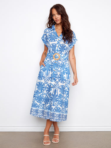 Blue and white printed eyelet cotton dress in maxi length, highlighted by an elegant belt by Charlie B.