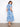Blue and white printed eyelet cotton dress with front button closure, complete with a fashionable belt by Charlie B.