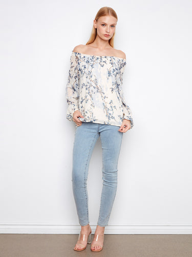 Chic blouse with balloon sleeves and a soft eyelet design, adding elegance to any outfit by Charlie B.
