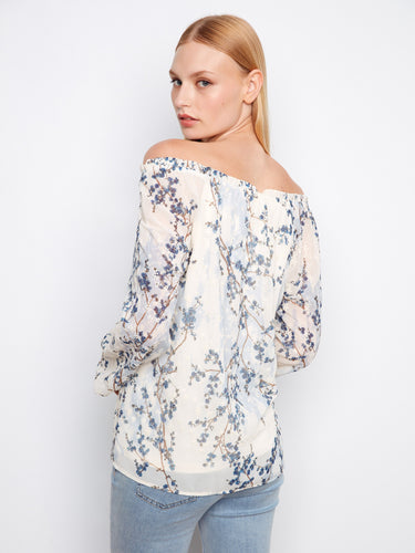Elegant blouse with flowing fabric that highlights the off-the-shoulder style beautifully by Charlie B.