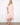Elegant dress featuring a V-neckline and self-tie belt, perfect for any occasion. Designed by Charlie B.