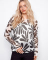 Daisy printed sweater featuring a chic fishnet crochet design for a trendy look by Charlie B.