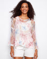 Floral mesh top with a flattering V-neck design, perfect for any casual outing. The loose fit ensures comfort throughout the day by Charlie B.