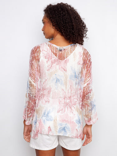 The delicate mesh fabric of this top adds an airy feel, while its slit hem provides a modern touch to your wardrobe essentials by Charlie B.