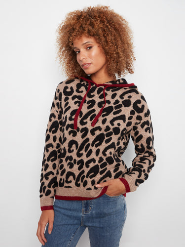 This sweater features a striking animal print, perfect for making a bold statement in any casual setting. By Charlie B.