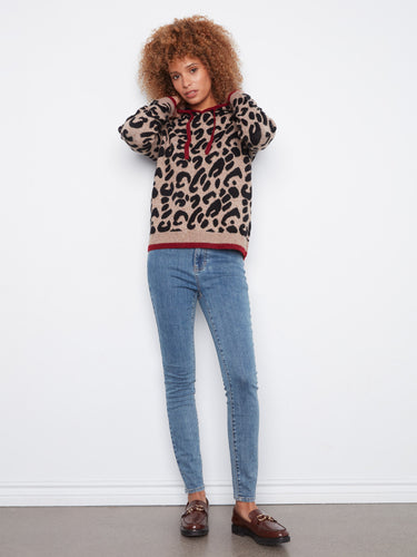 Crafted with long sleeves, this piece ensures warmth and comfort during cooler days while maintaining chicness. By Charlie B.
