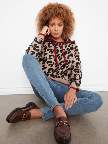 Ribbed cuffs and hem provide a snug fit, enhancing both the functionality and style of this cozy knitwear. By Charlie B.
