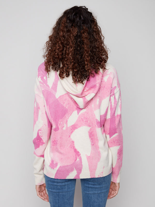 Vibrant pink abstract print on this hoodie sweater, complete with an adjustable hood by Charlie B.