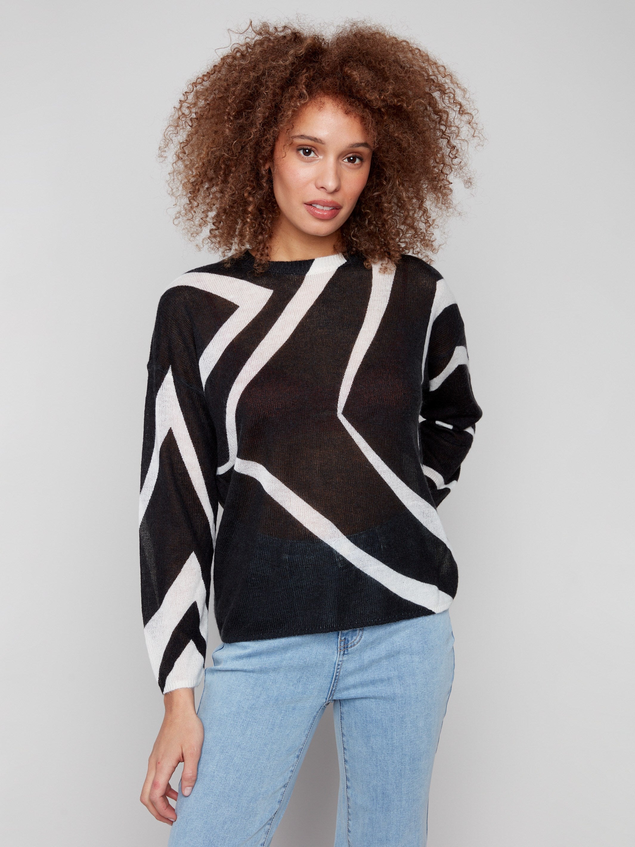 Sweater with semi-sheer knit and geometric pattern in Black/Ecru, offering a stylish crew neckline by Charlie B.
