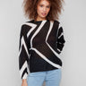Sweater with semi-sheer knit and geometric pattern in Black/Ecru, offering a stylish crew neckline by Charlie B.