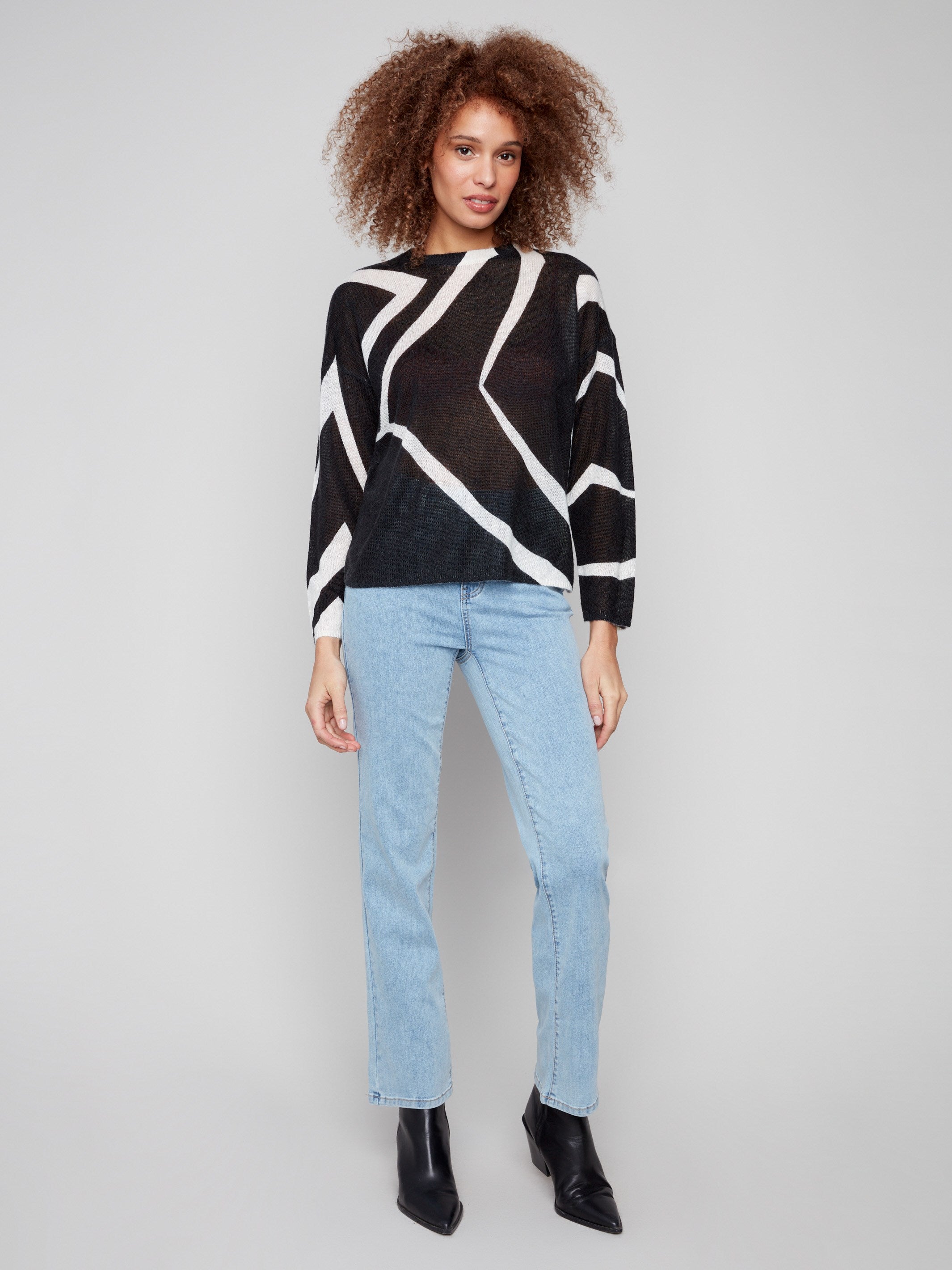 Black/Ecru mohair-like sweater with drop shoulders, featuring a chic geometric design by Charlie B.