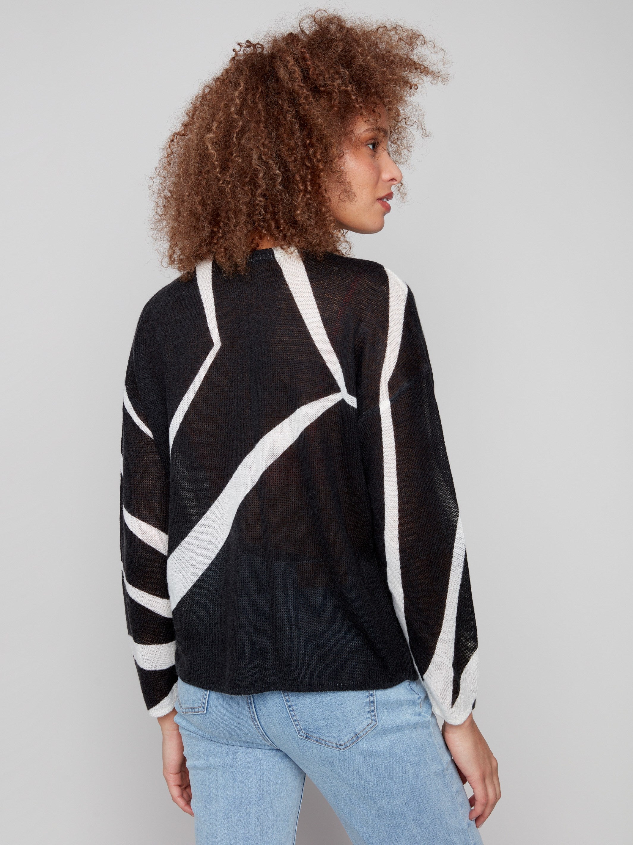 Geometric pattern sweater in Black/Ecru with long sleeves, crafted from lightweight fabric by Charlie B.