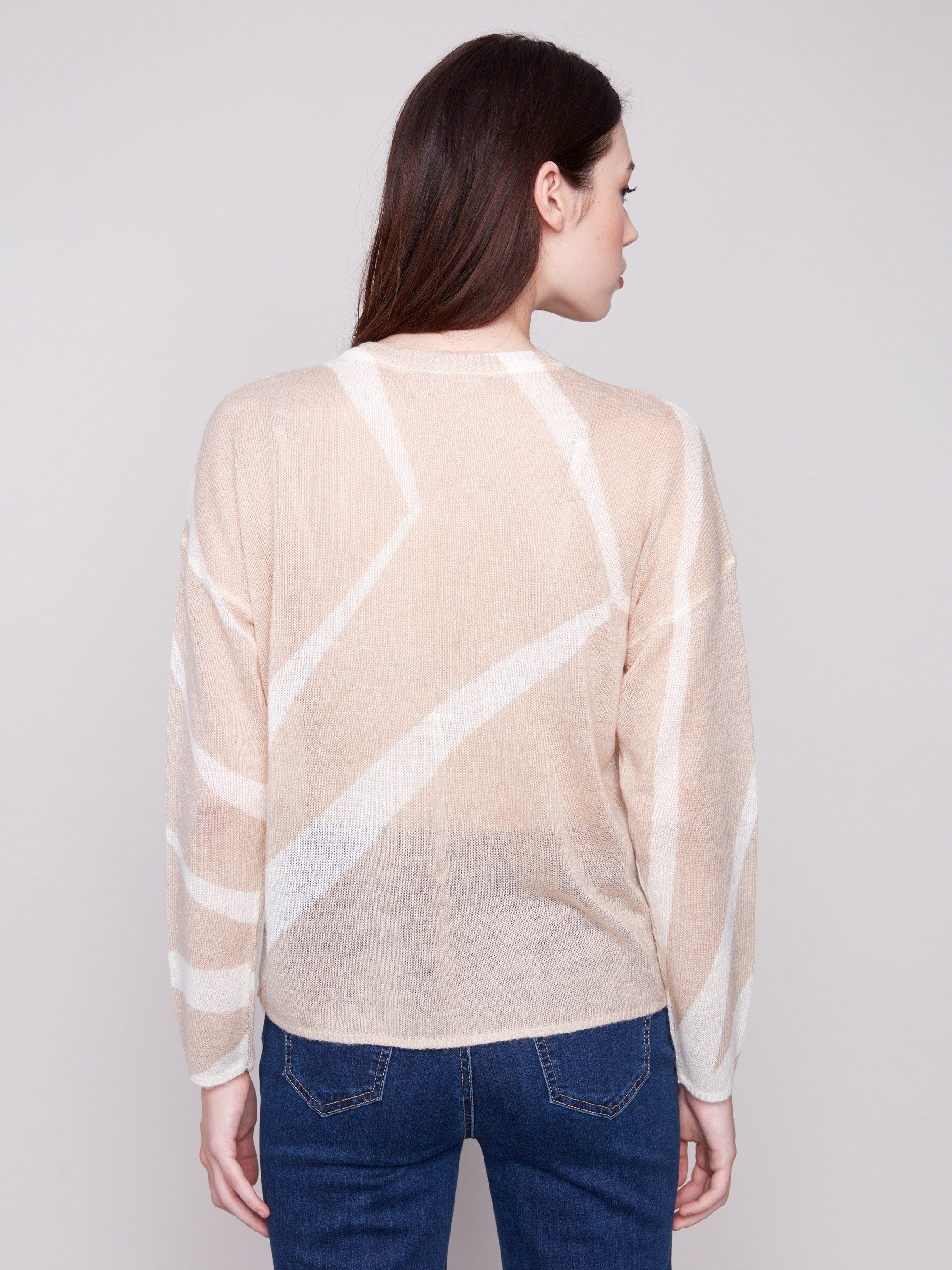 Chic mohair-like sweater in Sesame/Ecru with long sleeves, highlighting the crew neckline and modern pattern by Charlie B.