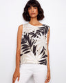 Tropical print top with a crew neckline, perfect for casual outings. Its relaxed fit offers comfort and style. By Charlie B.