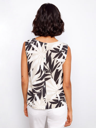 Stylish black and white leaf print top with a comfortable crew neckline, ideal for warm days out. By Charlie B.
