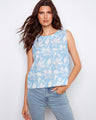 Elegant top with a crew neckline, showcasing a floral pattern in soft blue and white hues. Perfect for casual wear by Charlie B.