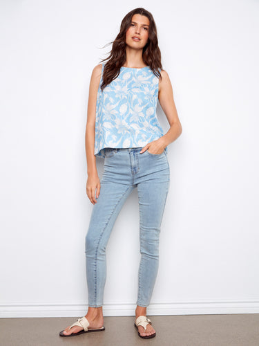 Chic sleeveless top featuring back button detail, offering a stylish twist to your wardrobe essentials by Charlie B.