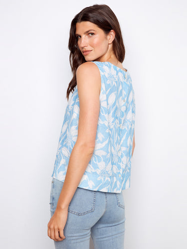 Casual yet refined blouse featuring beautiful back button detail that enhances its elegant appeal by Charlie B.