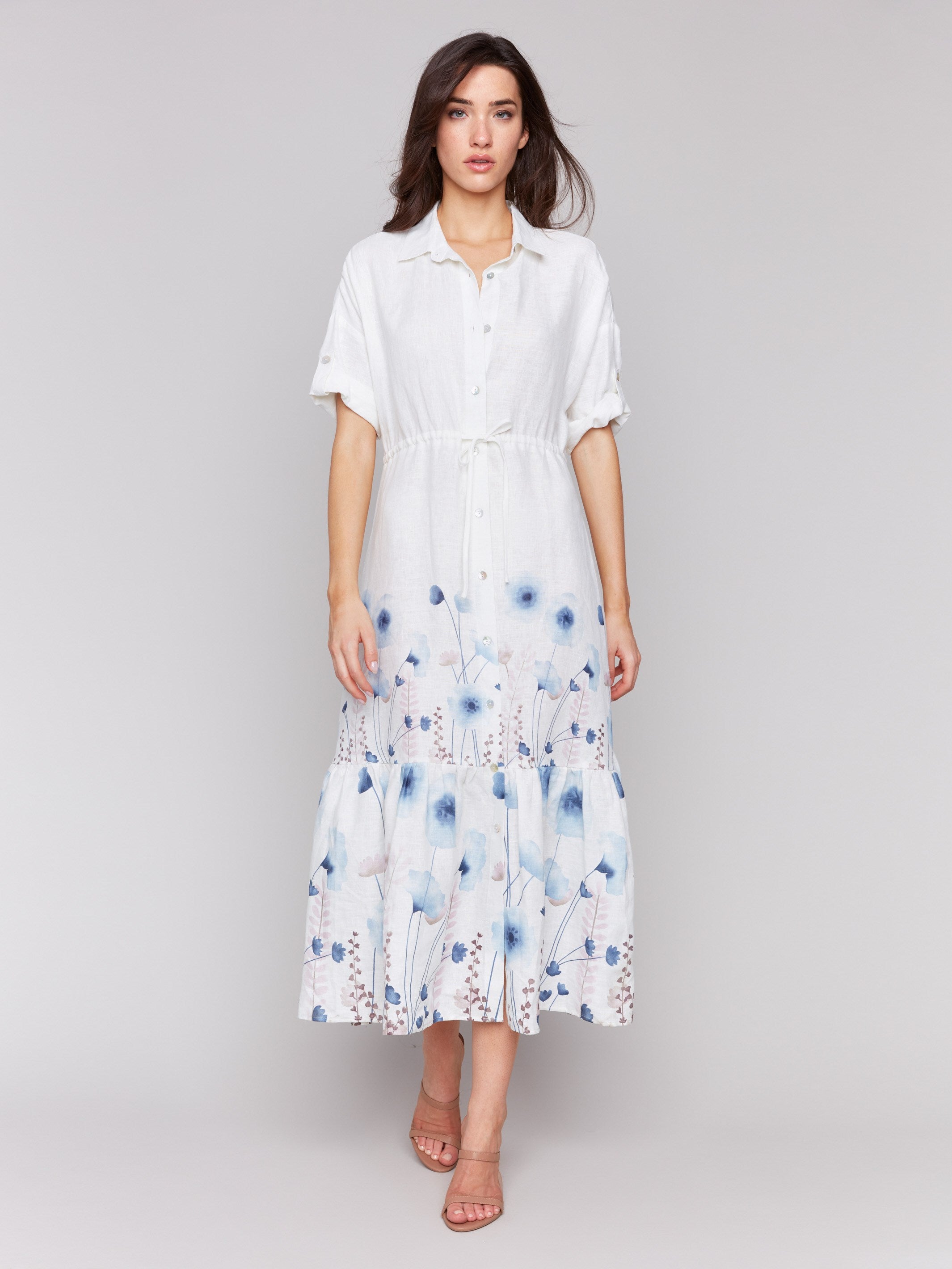 Linen blend dress featuring a tiered hemline and blue floral print by Charlie B.