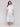 Dress with adjustable drawstring waist and collar neckline in a maxi length by Charlie B.