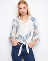 Stylish blouse with a Johnny neckline, showcasing a chic pattern and elegant design for versatile wear. By Charlie B.