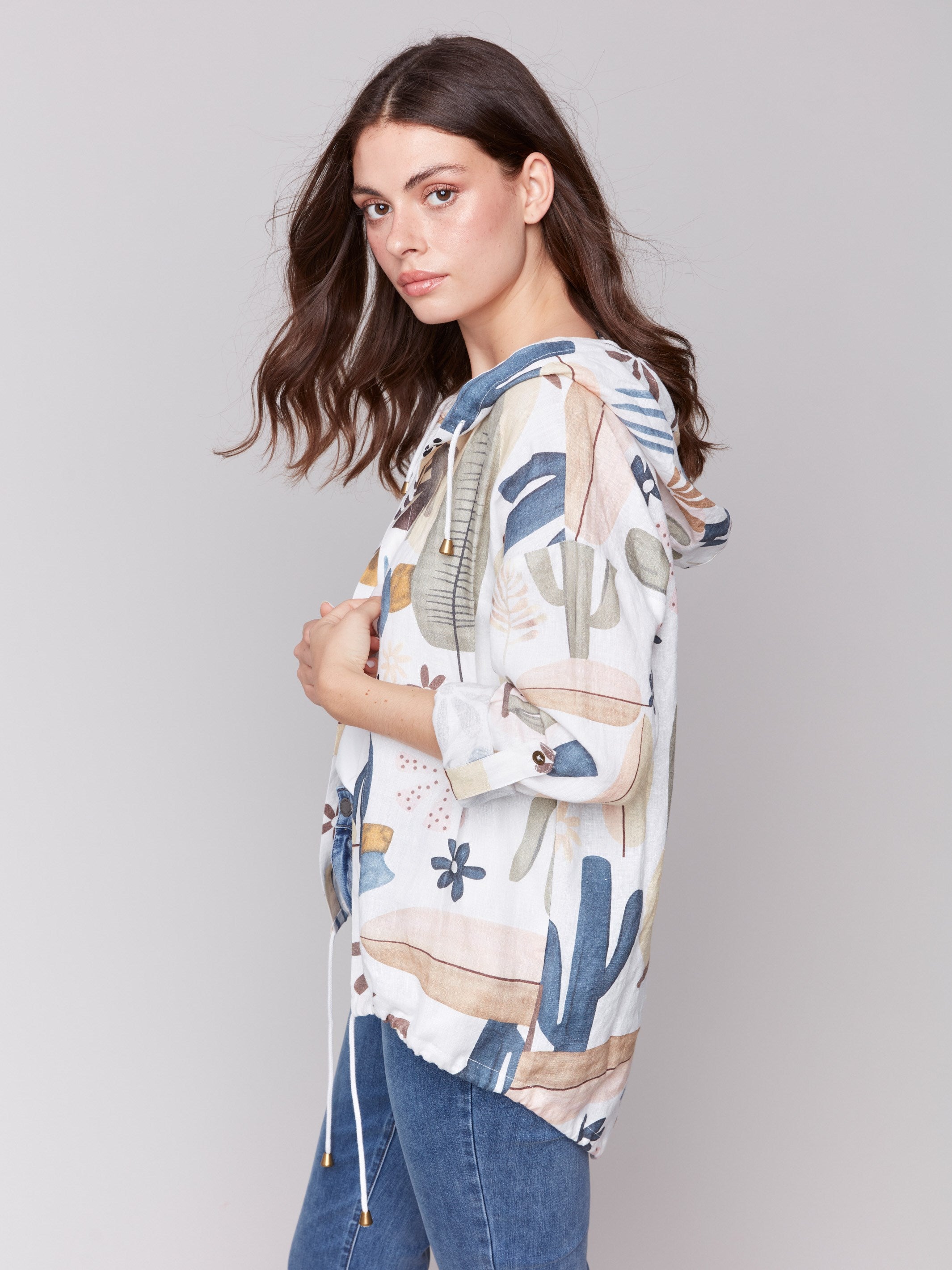 Roll-up sleeve jacket showcasing multicolored abstract patterns by Charlie B.