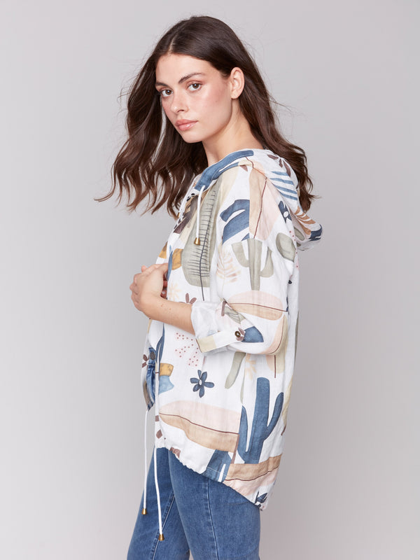 Roll-up sleeve jacket showcasing multicolored abstract patterns by Charlie B.