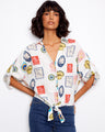 Blouse with postcard print featuring a V-neck and tie-front, perfect for casual days by Charlie B.