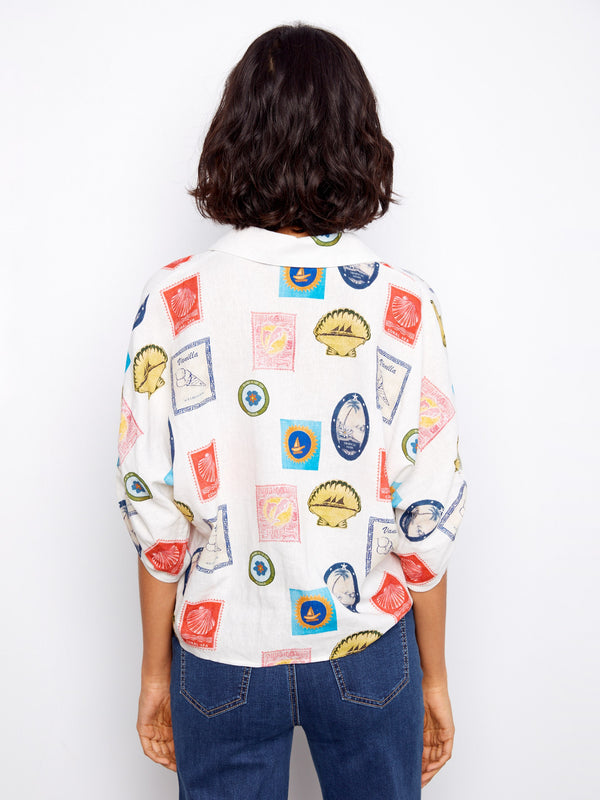 Casual blouse in postcard print with V-neck and short adjustable sleeves by Charlie B.