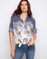 Elegant V-neck blouse featuring a chic button-up style and intricate paisley design, perfect for any occasion by Charlie B.