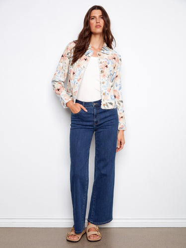 The frayed edges on this stylish floral jacket add a touch of casual elegance, making it versatile for various occasions by Charlie B.