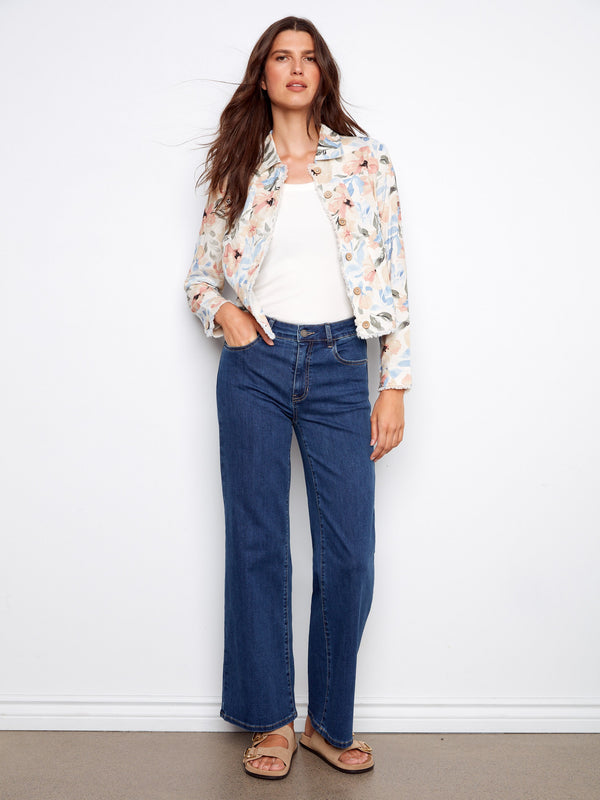 Versatile floral jacket designed with convenient front pockets, merging style and practicality seamlessly by Charlie B.