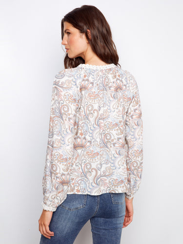 Graceful top adorned with a charming paisley pattern and crochet trim accents by Charlie B.