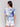 T-shirt with front twist design and blue abstract motif by Charlie B.