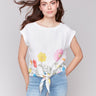 Blouse with a crew neckline and vibrant floral accents by Charlie B.